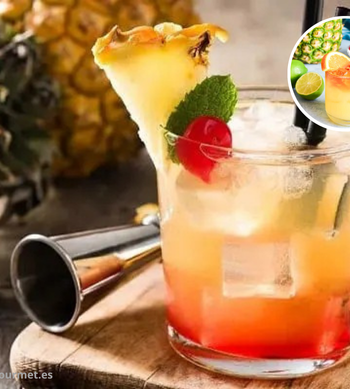 Cóctel Mai Tai en vaso tiki con hielo, mezcla de ron, lima, curaçao y sirope de almendra, decorado con menta y lima