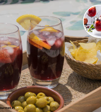 Vaso de sangria española con frutas frescas y vino tinto