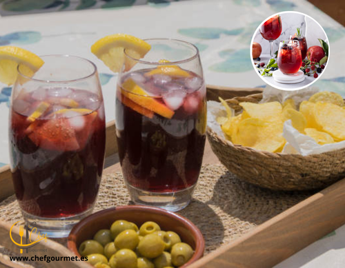 Vaso de sangria española con frutas frescas y vino tinto